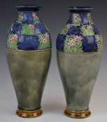 Royal Doulton pair of pedestal vases with floral decoration one with impressed marks for Maude
