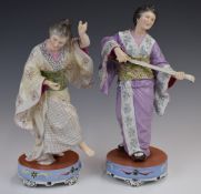 A pair of Meissen style porcelain figures of a Japanese musician and dancer, with good blue