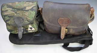 Two shotgun cartridge bags, one leather and canvas the other Timber Fox camouflage together with a