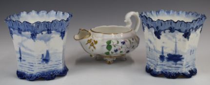Early 19thC porcelain cream jug with floral decoration, elaborate spout and gilt embellishment,