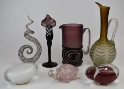Seven pieces of art glass including two jugs with applied decoration, candlestick, tortoise
