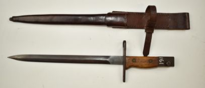 Japanese Arisaka type 30 bayonet with wooden grips, 25.5cm double edged blade, scabbard and frog.