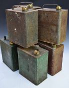 Seven vintage two gallon petrol cans comprising 1935 Pratts with cap, 1935 Esso with cap, another