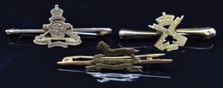 Three 9ct gold sweetheart brooches for Royal Artillery, Machine Gun Corps and West Yorkshire