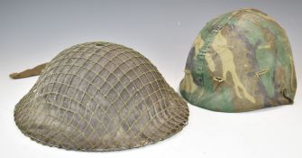 Two steel helmets comprising an American Vietnam War pattern example with DPM cover and new sweat