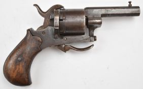 Unnamed 7mm six-shot double-action pin-fire revolver with folding trigger, shaped wooden grips and