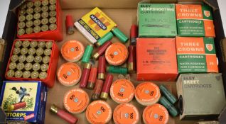 A collection of 12 bore shotgun cartridges and Eley Surefire primers including Winchester Cannon