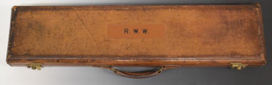 Leather bound shotgun carry case together with a GunGuard pistol or revolver case and a collection