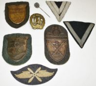 Three replica WW2 German Nazi Third Reich badges Krim 1941-1943, Demjansk 1942 and Kuban 1945,