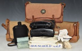 Three St John Ambulance No 15a haversacks, all with metal First Aid cabinets and associated