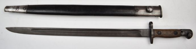 British 1907 pattern bayonet with some stamps to ricasso, wooden grips, 43cm fullered blade and