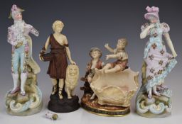 Four continental ceramic figures including faux ivory figure with lion, probably Rudolstadt, with