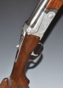 SKB 12 bore over and under ejector shotgun with engraved locks, underside, trigger guard, thumb