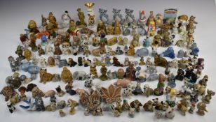 A large collection of Wade Whimsies, Disney figures including 101 Dalmatians and Lady and the Tramp,