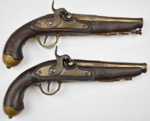 A pair of Spanish percussion converted from flintlock hammer action pistols, each with engraved lock