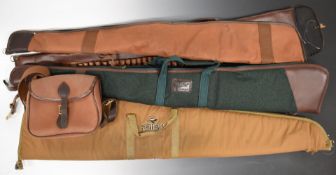 Four canvas and leather shotgun slips including Napier and RedHead together with a similar shotgun