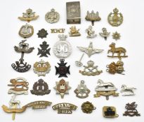 Approximately thirty British Army Infantry badges including Dorsetshire Regiment (with Gladman's