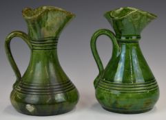 Farnham Art Pottery near pair of trefoil shaped jugs, height 18cm