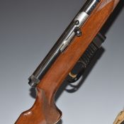 Voere .22 bolt-action rifle with chequered semi-pistol grip, raised cheek piece, magazine, pop-up