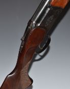 Baikal NX-27E-IC 12 bore over and under ejector shotgun with engraved lock and trigger guard,