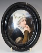 KPM / Berlin hand painted porcelain plaque of a pensive young woman, maximum diameter 13cm, in