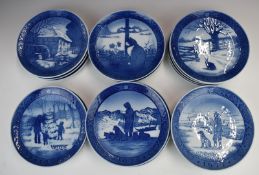 Eighteen Copenhagen Christmas plates 1968-1985, diameter 18.5cm