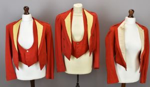 Three British Army Gloucestershire Regiment officer's scarlet mess jackets, one with rank insignia