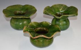 Farnham Art Pottery three flared dishes / candle holders including a pair, 8cm tall