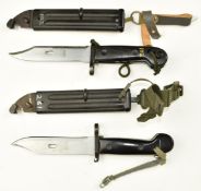 Two Russian Dragunov bayonets both with 15cm serrated blades, scabbards and frogs. PLEASE NOTE ALL