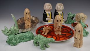 Poole Pottery charger and pin dish, WMF footed dish, two Martell brandy advertising jugs and a