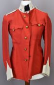 British Army other ranks scarlet jacket with collar badges and associated buttons, attributed to the