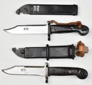 Two Romanian AKM assault rifle bayonets both with serrated blades, scabbards and frogs, longest