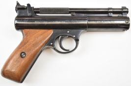 Webley Senior .177 air pistol with shaped wooden grips and adjustable sights, serial number 740.