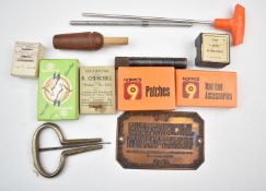 A collection of gun and shooting related items including R Churchill 'Flicker' No. XXV, 12 bore