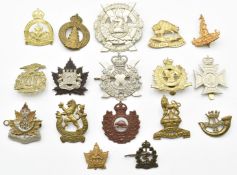 Seventeen Canadian badges including Fort Garry Horse, Royal Highland Infantry and Canadian Scottish,