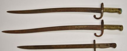 Two French 1866 pattern chassepot bayonets, both with yataghan blades, longest 57cm together with