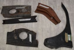 Car repair panels including Metro, Herald, Cortina and Ford Escort and a large quantity of fan