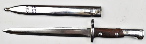 Luxemburg SAFN rifle bayonet stamped SA30 to pommel, with 23cm double edged blade and scabbard.