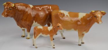 Beswick Guernsey bull, cow and calf, tallest 12cm