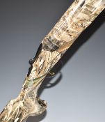 ATA 12 bore over and under ejector shotgun with all over Realtree Max-5 camouflage decoration,