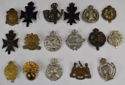 Seventeen British Army badges including 1st Battalion Blackpool Volunteers, Scottish Rifles, Tank
