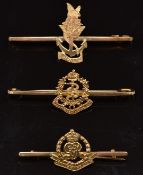 Three 9ct gold sweetheart brooches for the Military Police, Women's Royal Navy Service and