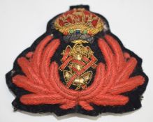 Queen Alexandra's Royal Naval Nursing Service cloth and bullion officer's cap badge, number to