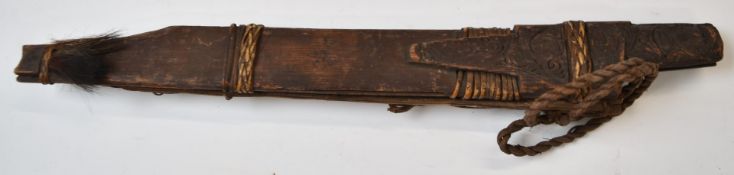 Borneo head hunter's wooden sword sheath with some carving and remnants of hair, length 46cm. PLEASE