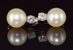 A pair of white gold earrings each set with a pearl (9mm) and a diamond of approximately 0.2ct, 4.