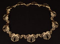 A 9ct gold necklace made up of scrolling links, Birmingham 1965, length 42cm, 19.8g