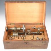 19th or early 20thC watchmaker's lathe with six jaw chuck, in original fitted box with accessories