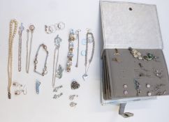 A collection of silver jewellery including earrings, rings, bracelets, pendants, charms etc