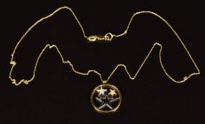 An 18k gold pendant in the form of stars set with diamonds, and an 18k gold chain, 3.3g