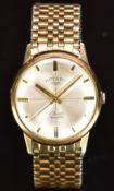 Rotary 9ct gold gentleman's wristwatch with gold hands and hour markers, silver dial and signed 17